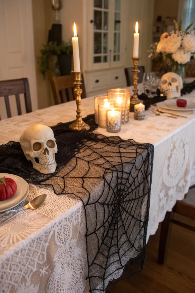 3 a halloween dinner table with a torn black che