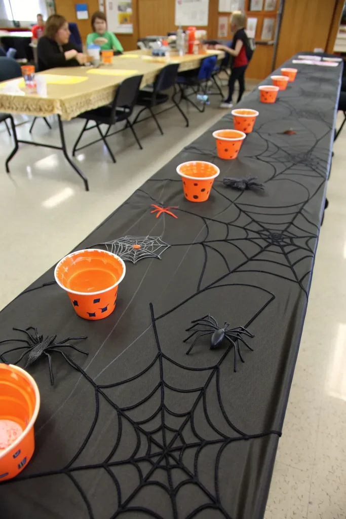 6 black spider web table runner stretched across